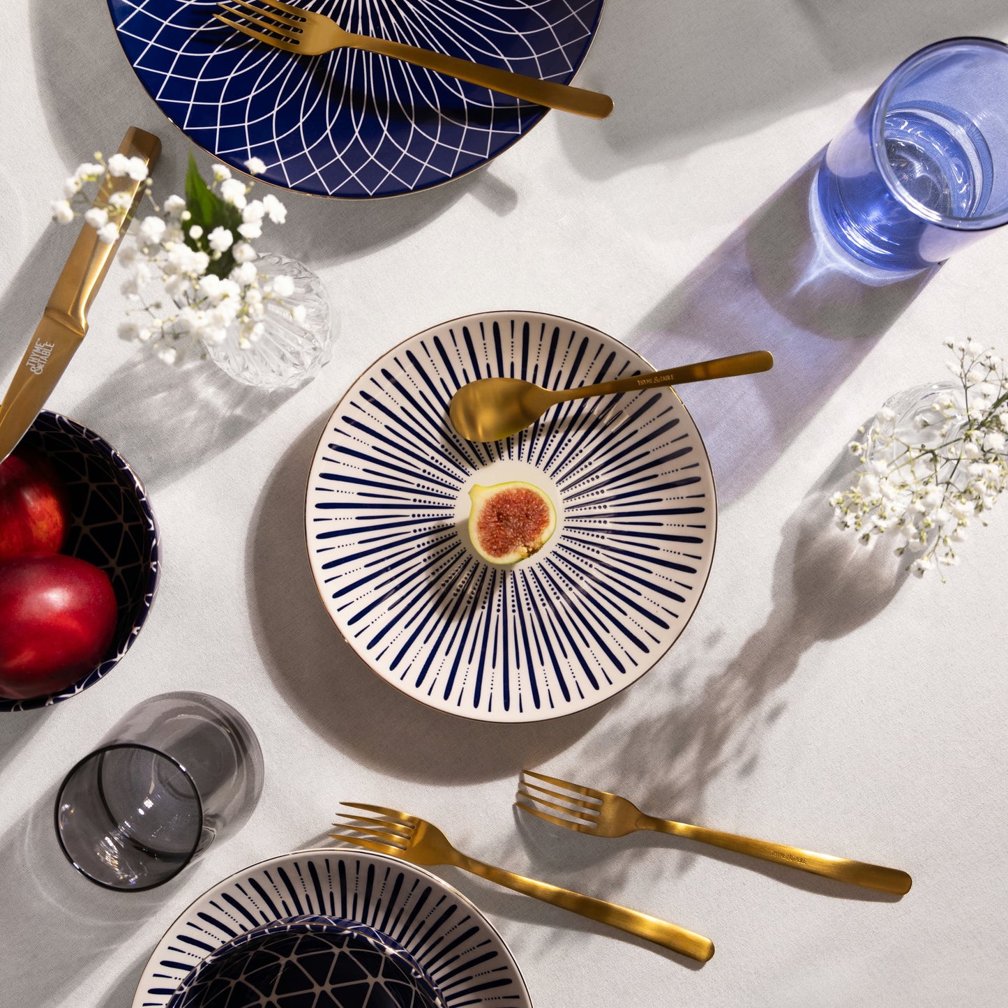 Blue and White Calypso 12-Piece Ceramic Dinnerware Set