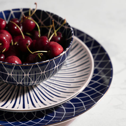Blue and White Calypso 12-Piece Ceramic Dinnerware Set